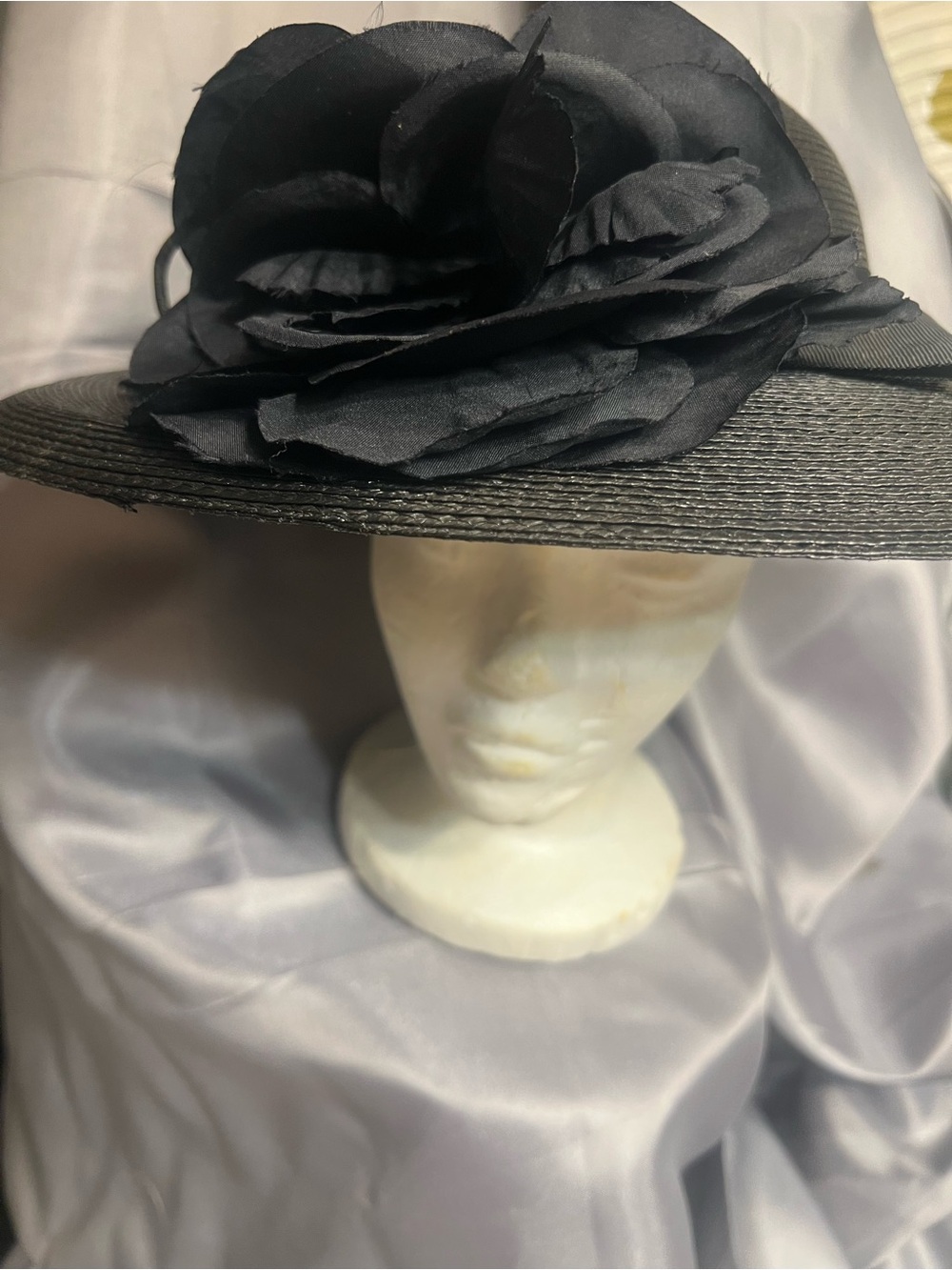 Elegant Black Wide-Brim Hat with Floral Accent